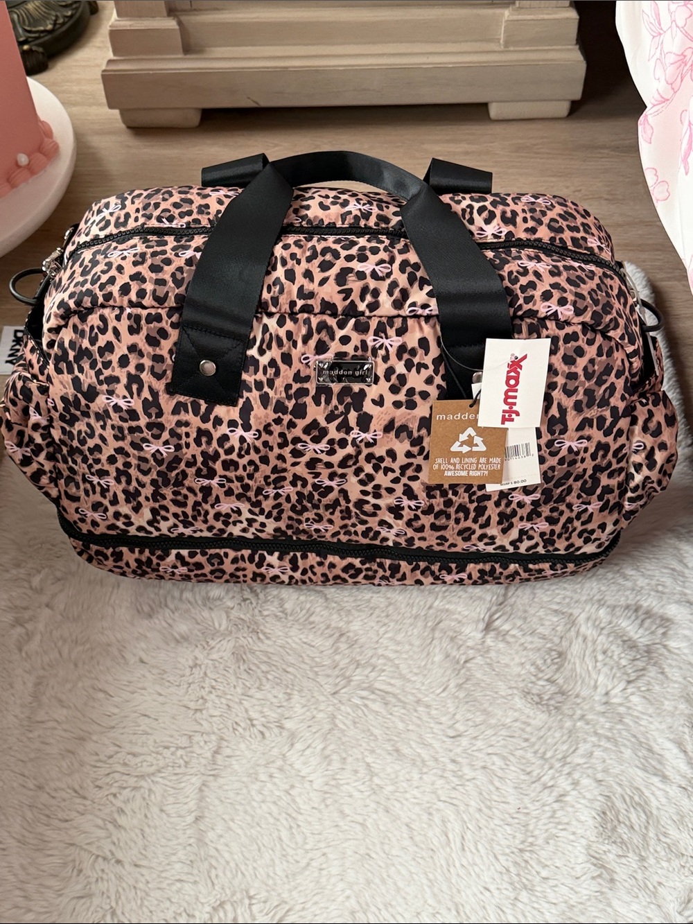 Second one I found.  Madden Girl Pink Leopard Travel Duffel with Black Straps